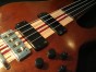 Fretless bass guitar in Imbuya (close up on body)